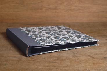 Square photo album with black pages with linen spine